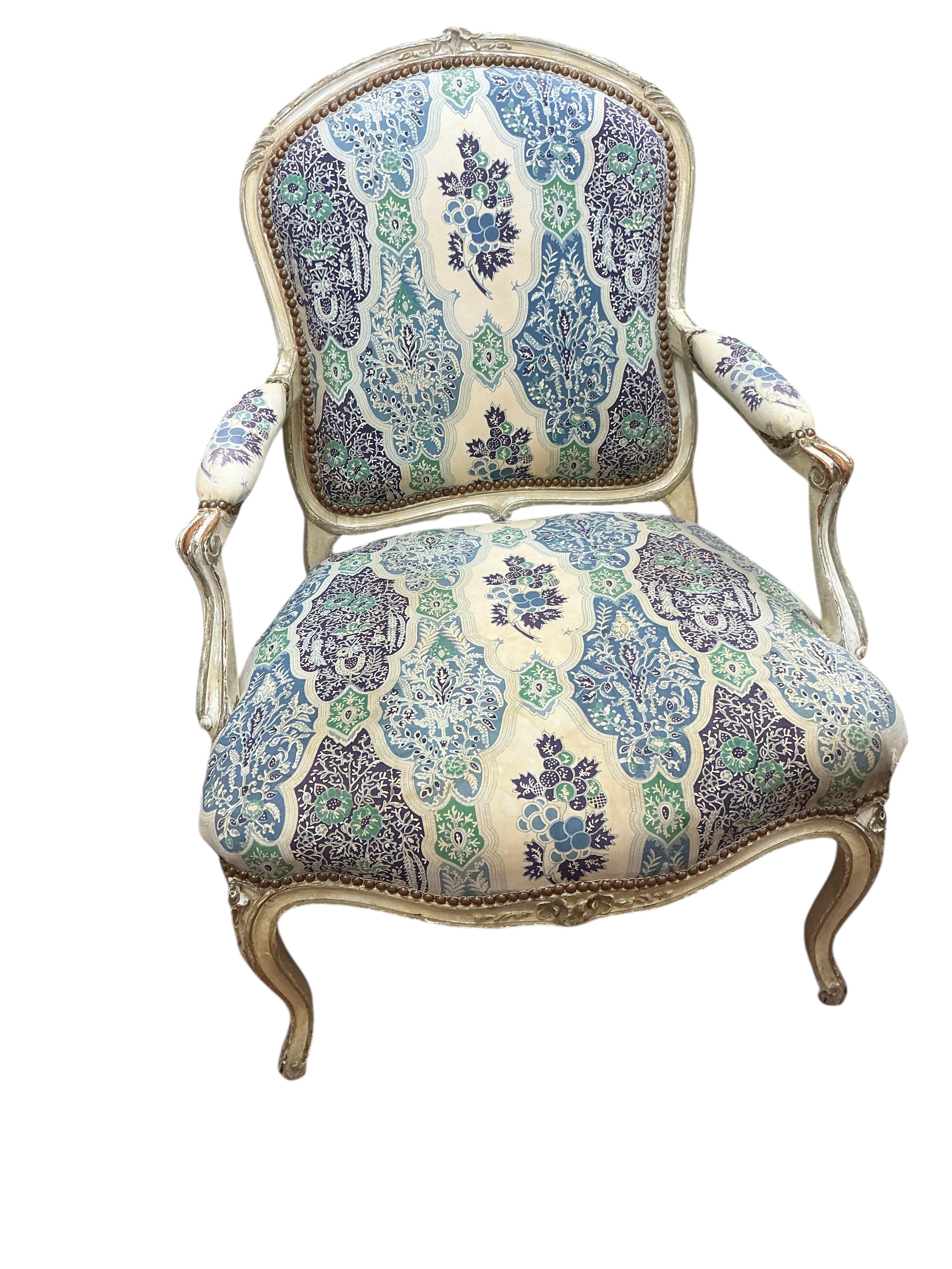 A pair of French elbow chairs, width 63cm, depth 58cm, height 94cm